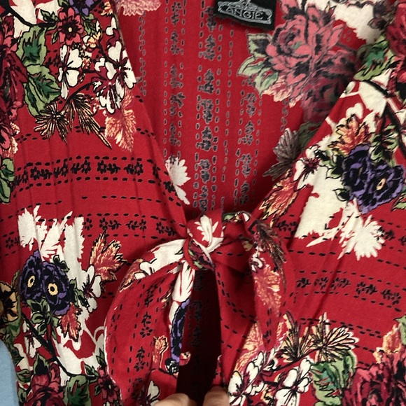 ANGIE Wide Leg bohemian floral jumpsuit with flirty peak a boo twist tie on top - Picture 4 of 13